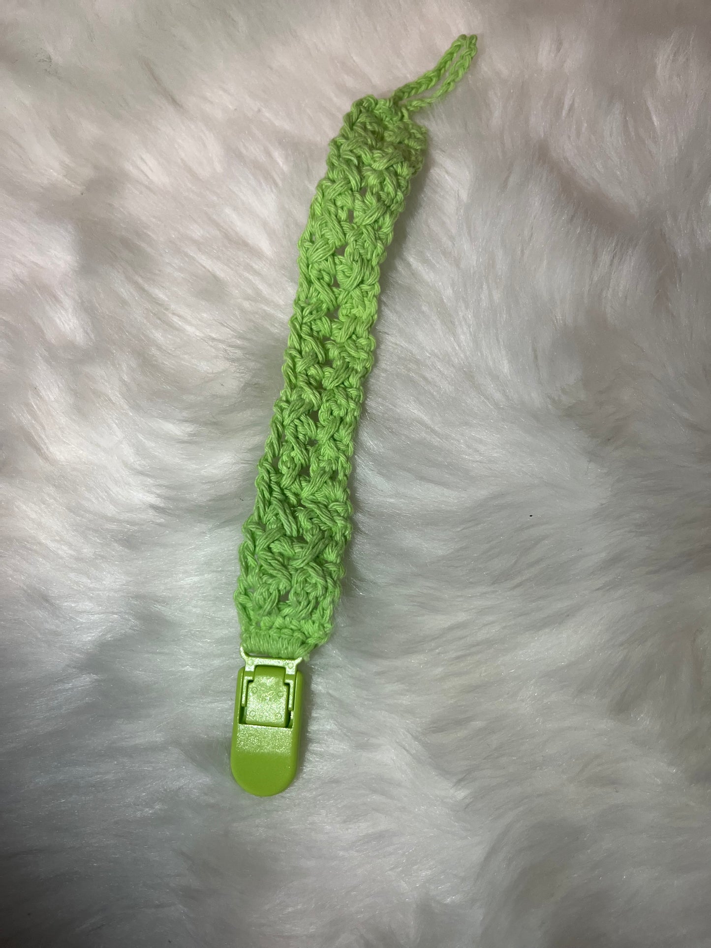Attache-tétine clips