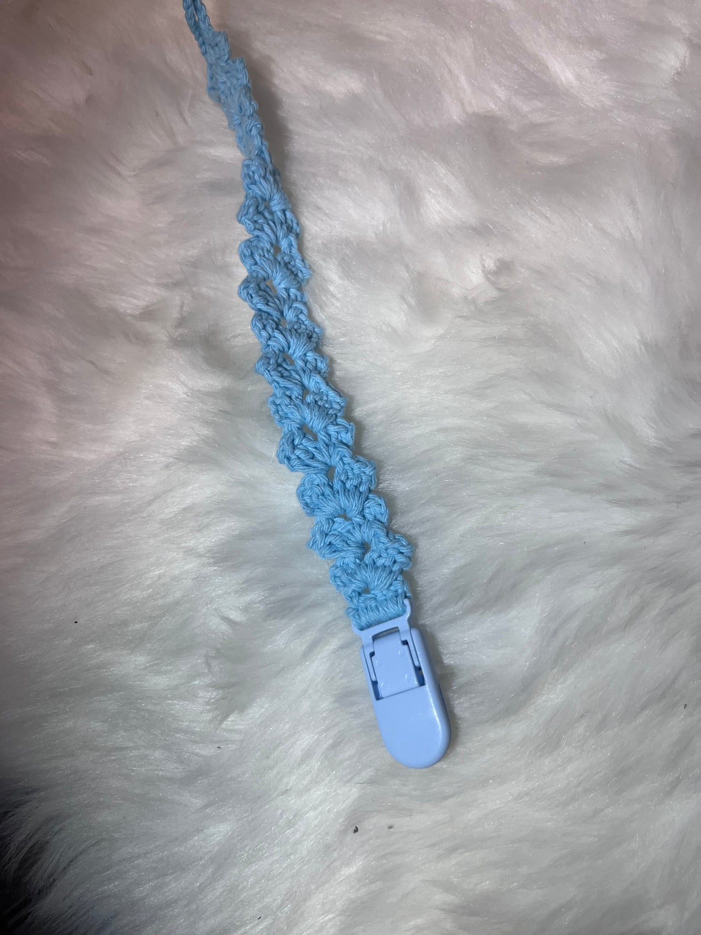 Attache-tétine clips