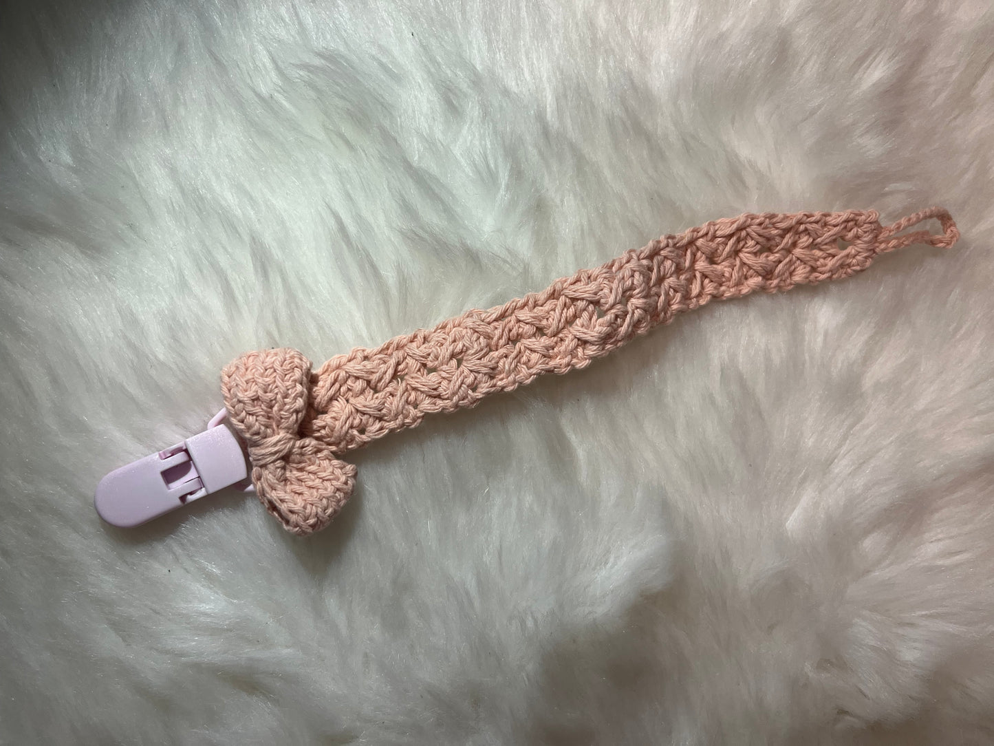 Attache-tétine clips